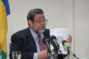 Gonzileaks: Prime Minister and Minister of Finance, Dr. Ralph Gonsalves, displays a confidential report from 2009 on the Building & Loan Association at a press conference in Kingstown, on Tuesday, Feb. 12. Gonsalves read sections of the report, against the explicitly written warning of the Ministry of Finance, which prepared it. (I-Witness News photo)