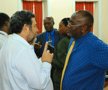 Prime Minister Gonsalves and NDP Senator and election candidate Major St. Clair Leacock chat at the House of Assembly this week. (Photo: Lance Neverson) 