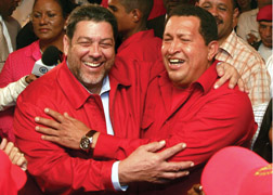 In this handout image released by Venezuela's Miraflores Press Office, Venezuela's President Hugo Chavez, right, is embraced by Saint Vincent and the Grenadines' Prime Minister Ralph Gonsalves upon Chavez's arrival to the Caribbean Island Friday, Feb. 16, 2007.  Kingstown will set up an embassy in Caracas next year. (AP Photo/Miraflores Press Office,HO)